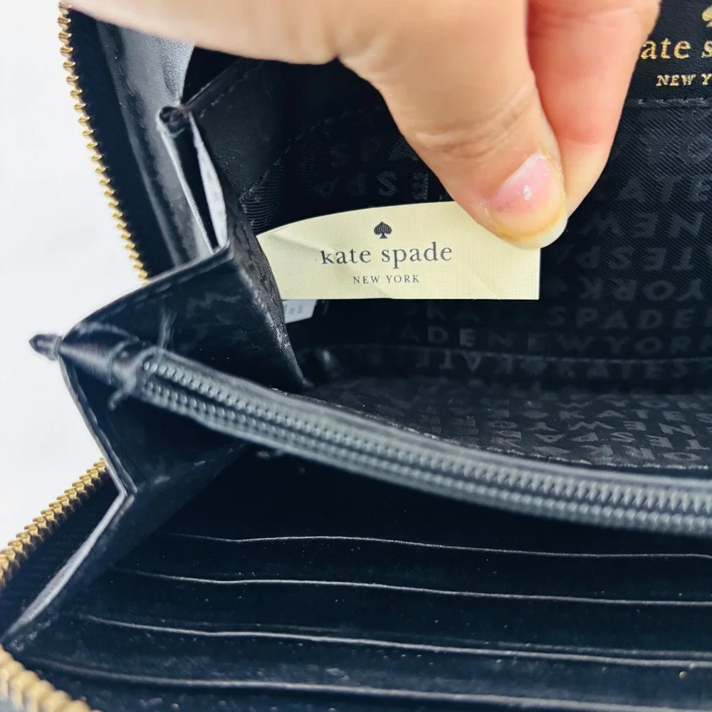 Kate Spade New York Chester Street Neda Black Pebbled‎ Leather Tassel Zip Wallet